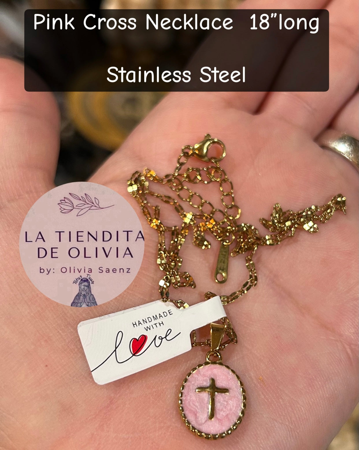 Pink  Cross Necklace  18” long

Stainless Steel