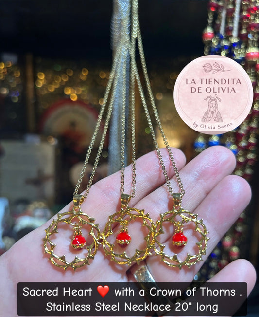 Sacred Heart ❤️ with a Crown of Thorns .
Gold Stainless Steel Necklace 20" long