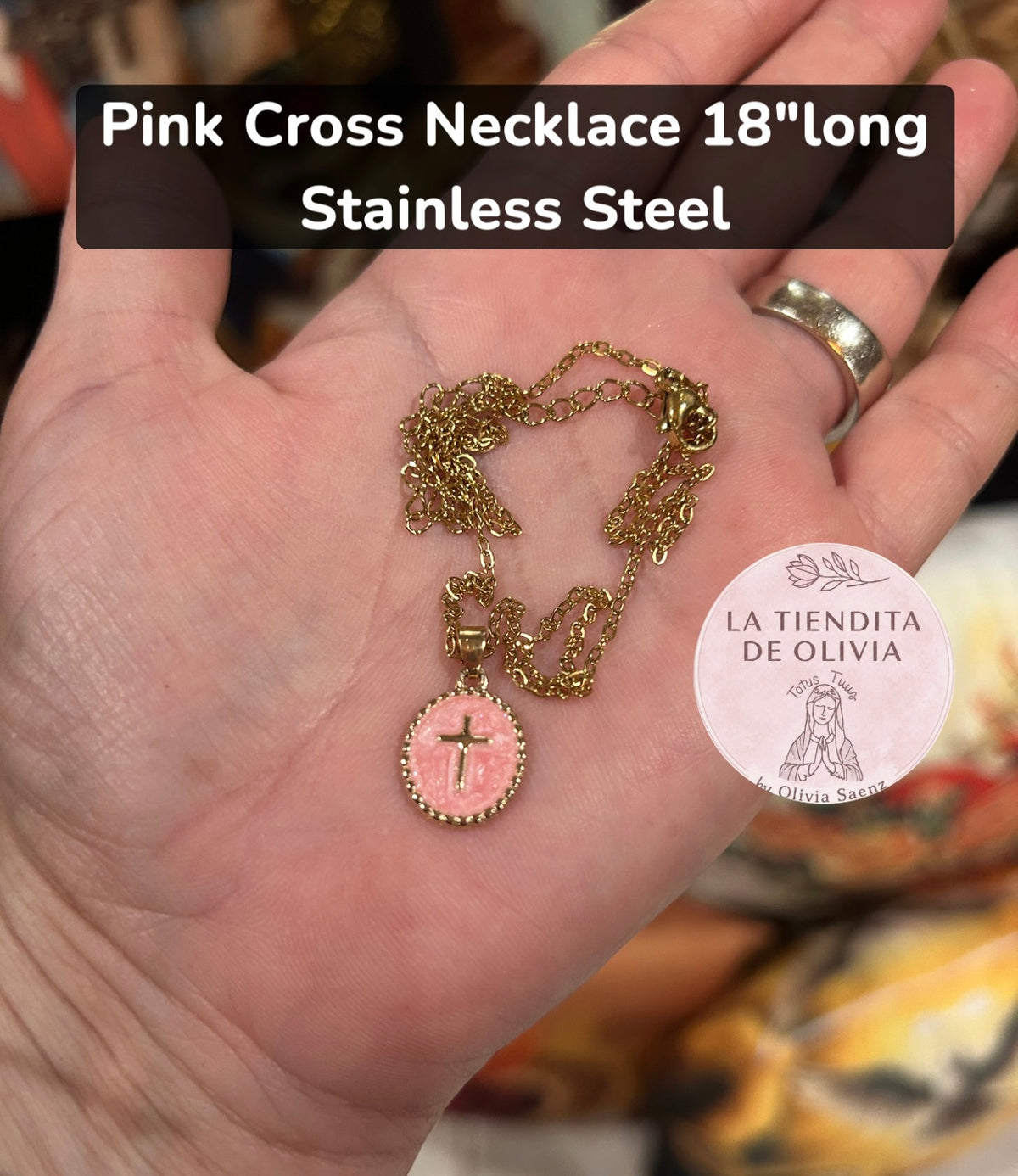Pink  Cross Necklace  18” long

Stainless Steel