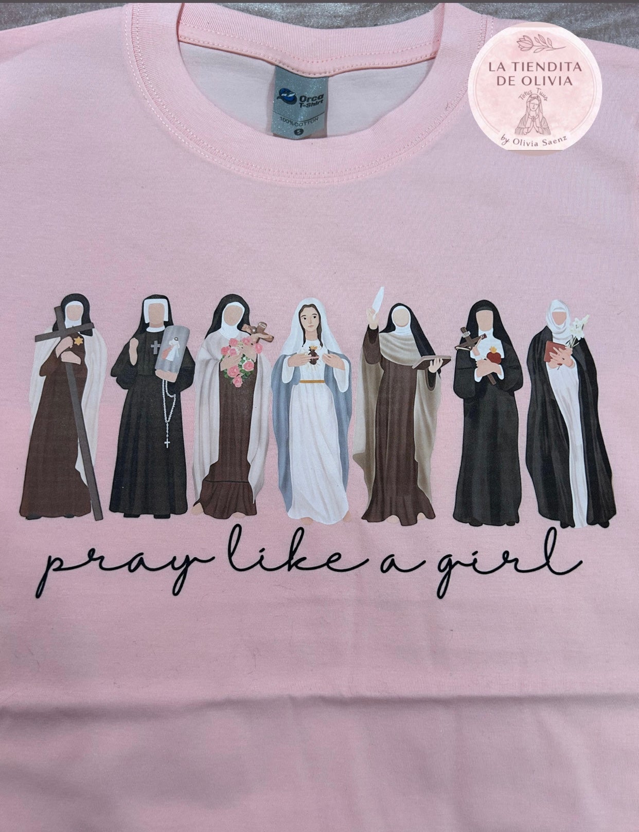 camisa santas católicas Talla M
Santa Edith Stein 
Santa Faustina 
Santa Teresita 
Inmaculado Corazón de la Virgen María 
Santa Teresa de Avila 
Santa Margarita de Alacoque
Santa Catalina