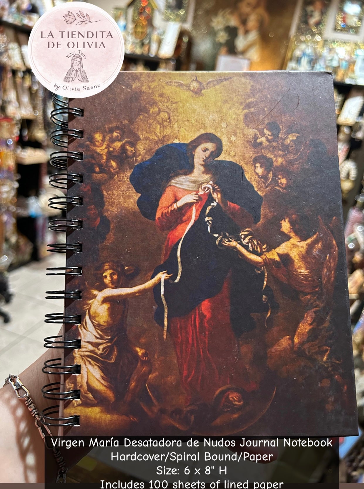 Virgen María Desatadora de Nudos Journal Notebook
Hardcover/Spiral Bound/Paper
Size: 6 x 8" H
Includes 100 sheets of lined paper