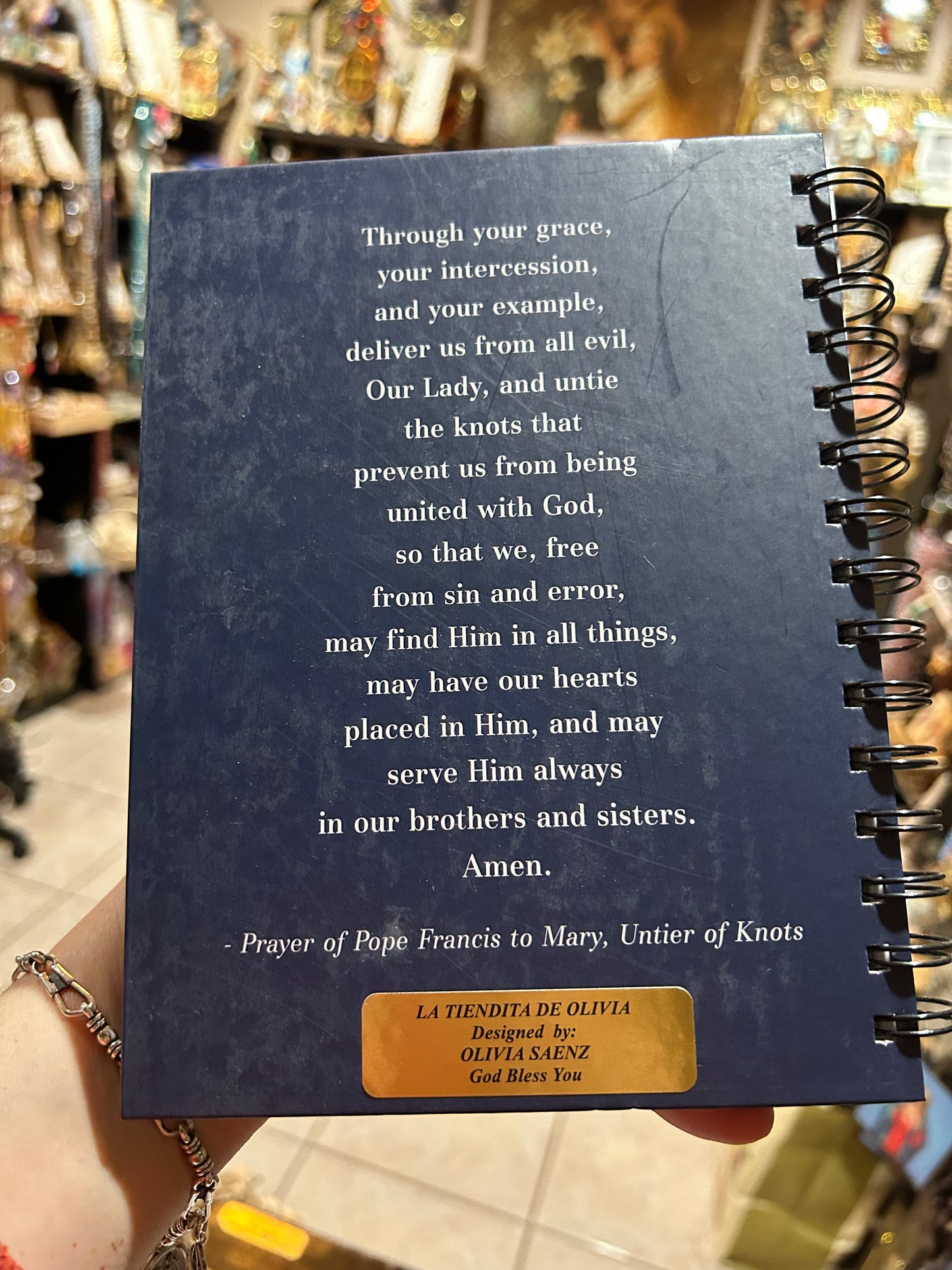 Virgen María Desatadora de Nudos Journal Notebook
Hardcover/Spiral Bound/Paper
Size: 6 x 8" H
Includes 100 sheets of lined paper